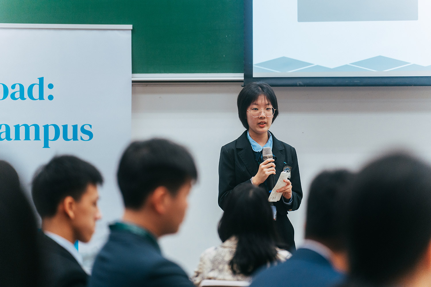 A young student finding her voice in front of the panel